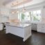 2.5 inch thick cararra marble island 1.25 inch thick carrara countertop 3x6 beveled with subway tile